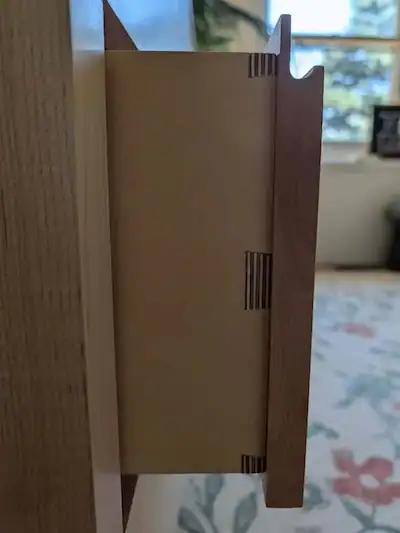 Close-up detail of hand-cut sliding dovetail joinery