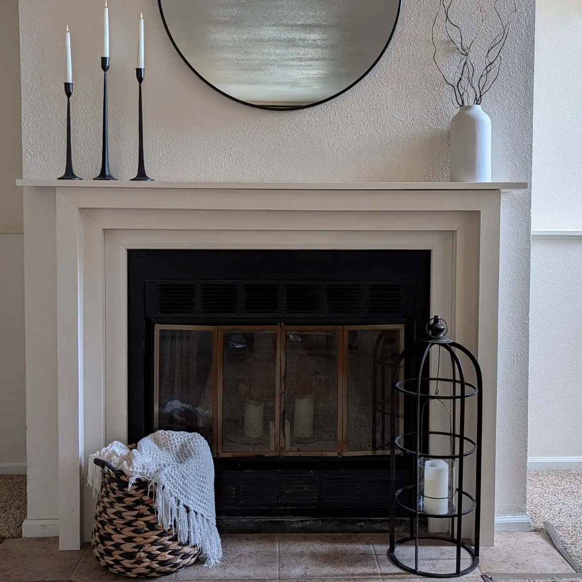 Custom wood mantel built over an existing fireplace