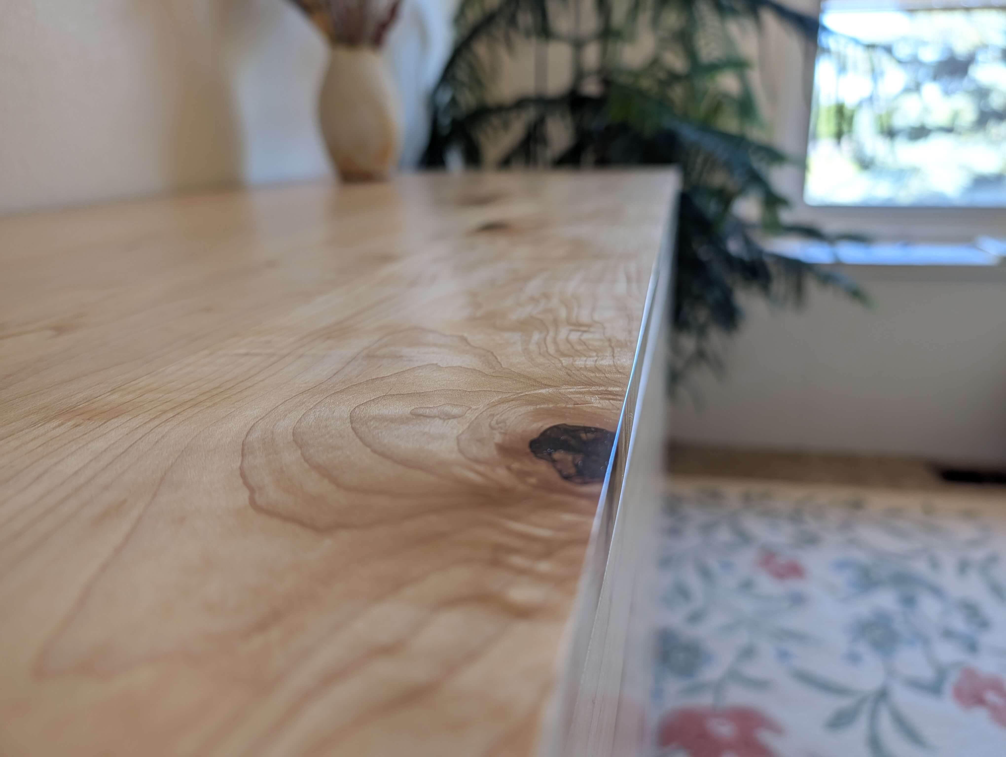 Custom wood dresser featuring epoxy grain fill