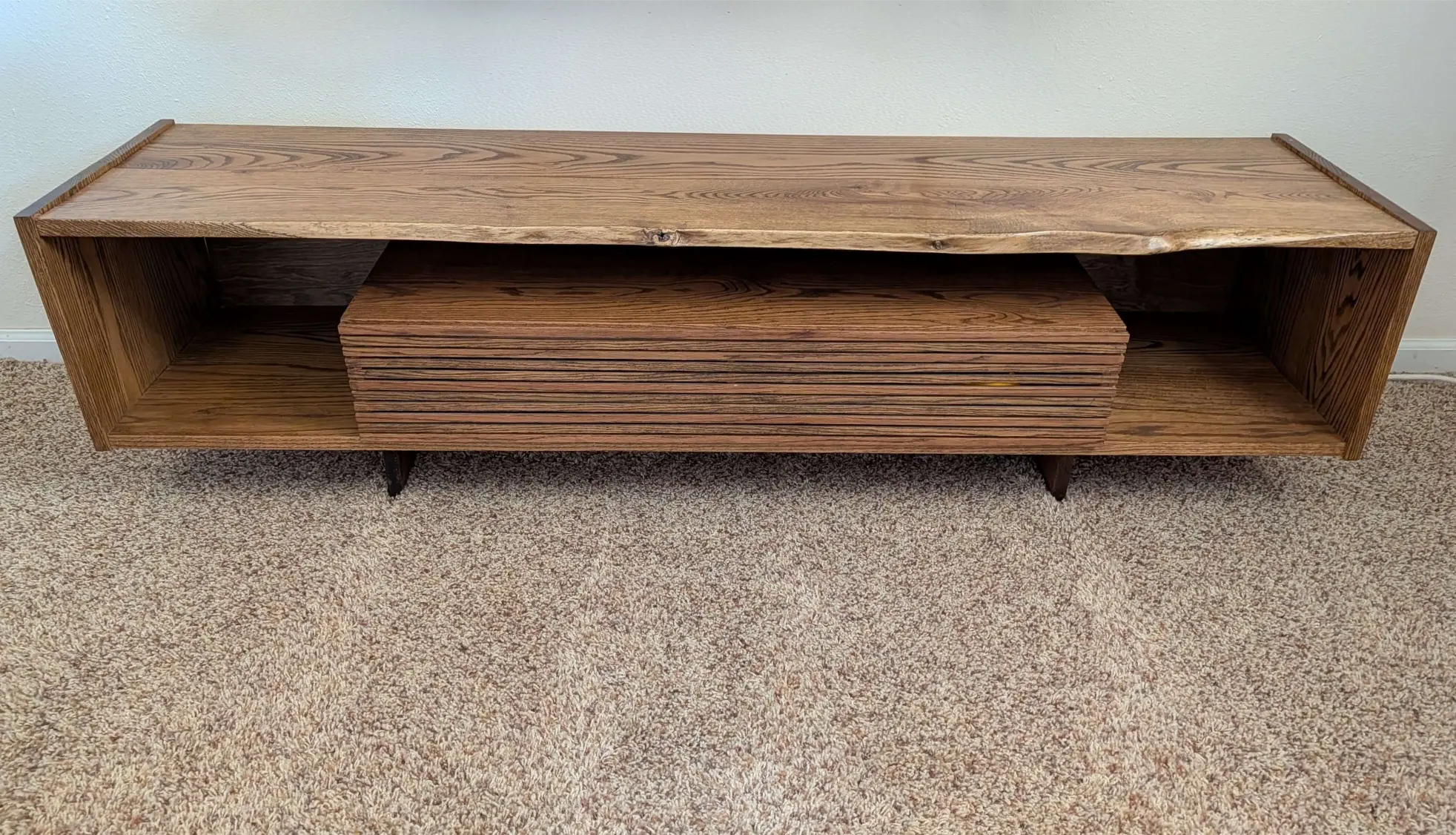 Modern live-edge wood TV stand built in Colorado