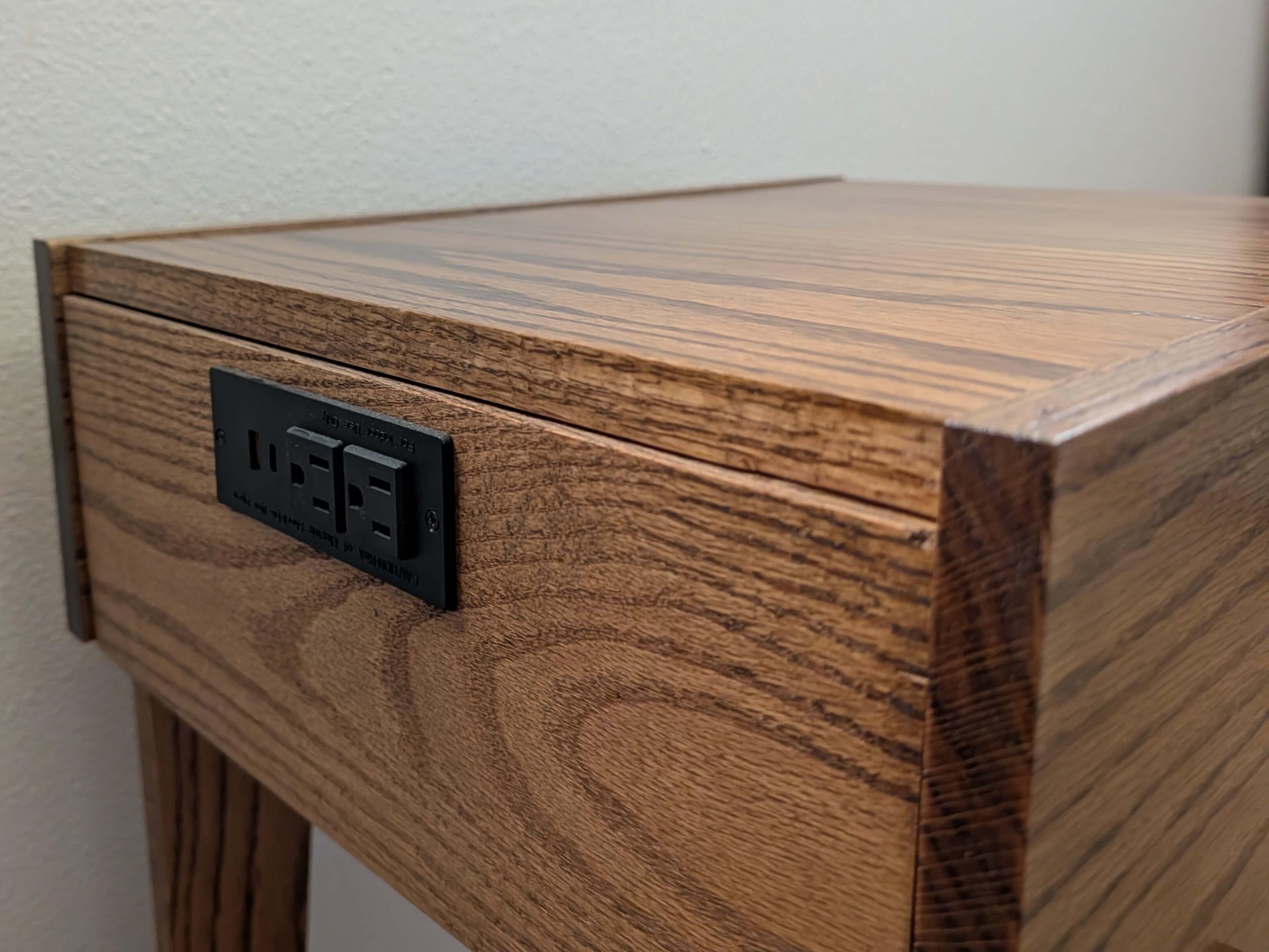 Custom side table with integrated USB charger