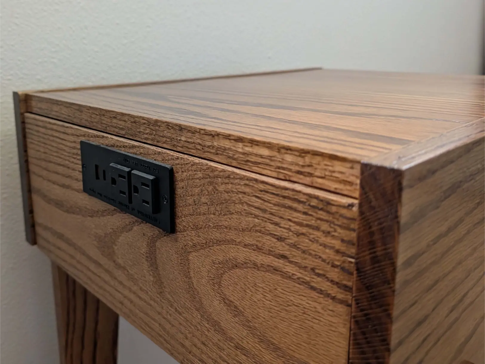 Custom side table with integrated USB charger
